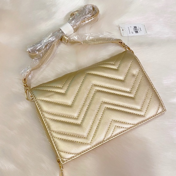 Francesca's Collections Handbags - NWT Francesca’s gold quilted wallet/clutch